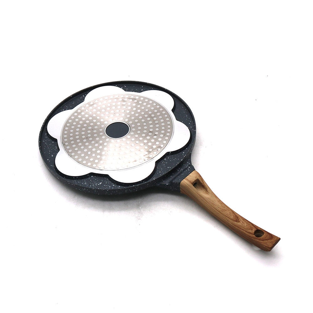 7-Hole Black Frying Pan With Smiley Face